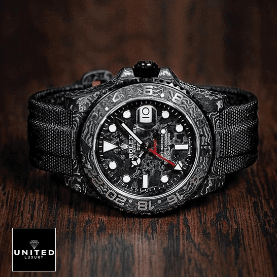 Rolex DiW NTPT Carbon Replica 4 Rolex DiW NTPT Carbon Black Replica on the table