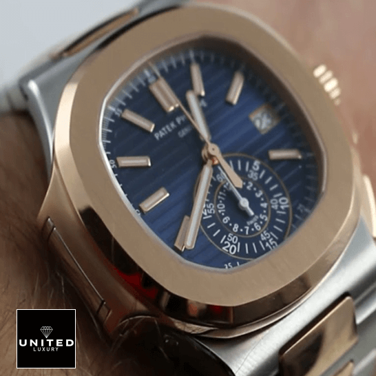 Patek Philippe Rose Gold 5980/1AR Replica 4 Patek Philippe Nautilus Blue Dial Gold Bezel Replica on the man wrist