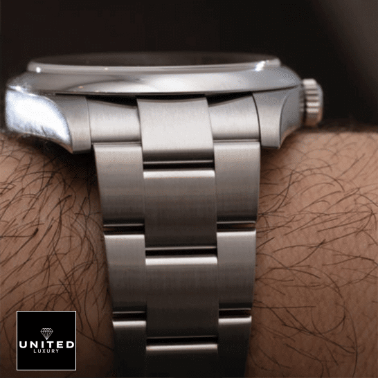 Rolex Oyster Perpetual Orange Dial 124300-0004 Replica 6 Rolex Perpetual 124300 Stainless Steel Oyster Replica on his arm