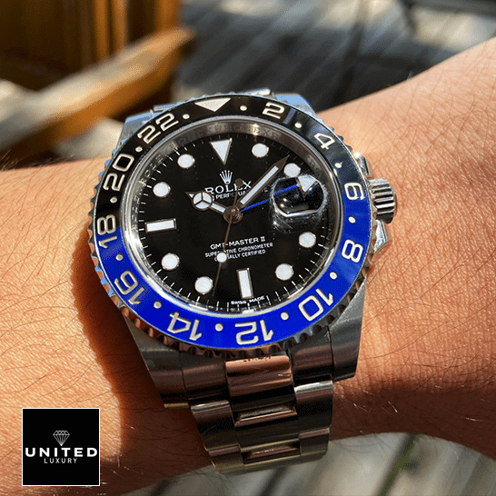 Rolex GMT-Master II Black Dial Batman Bezel 116710BLNR Oyster Replica 1 Rolex GMT-Master II Black Dial Batman Bezel 116710BLNR Replica on his arm