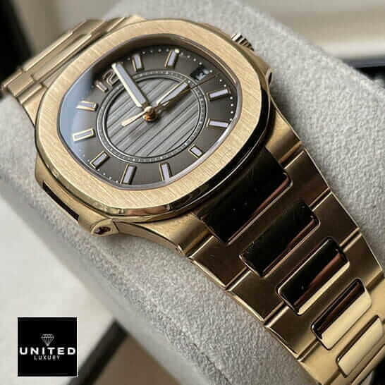 Patek Philippe Nautilus 7011/1R-010 Replica 2 Patek Philippe 7011-1R-010 Gold Bracelet Replica on the stand