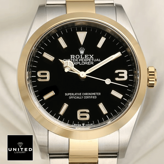 Rolex Explorer 124273 Black Dial Replica 4 Rolex 2021 Explorer 124273 Yellow Gold Bezel Replica cream tulle background