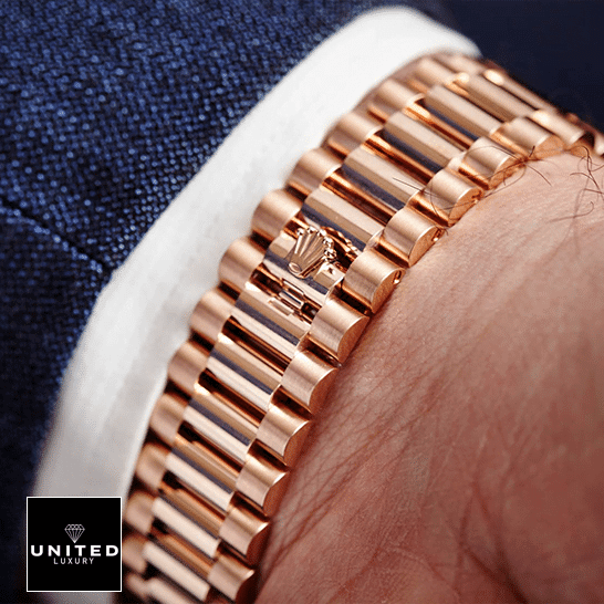 Rolex Day-Date 228235 AR Rose Gold Wrapped Rhodium Dial Replica 2 Rolex Rhodium gold jubilee replica rolex logo and on the wrist