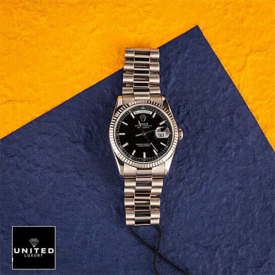 Rolex Day-Date Fluted Replica 2 Rolex Day-Date 118239 Replica Orange Blue Background