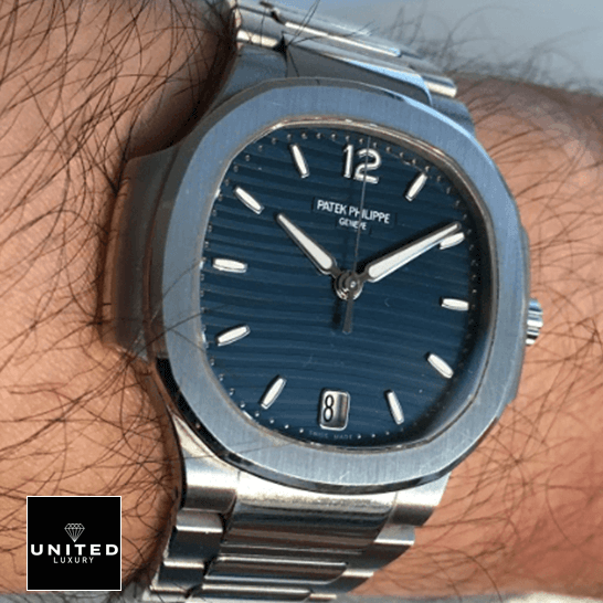 Patek Philippe Nautilus Ladies Blue Replica 5 Patek Philippe Nautilus 71181A-001 Blue Dial Geneve Replica on the man wrist