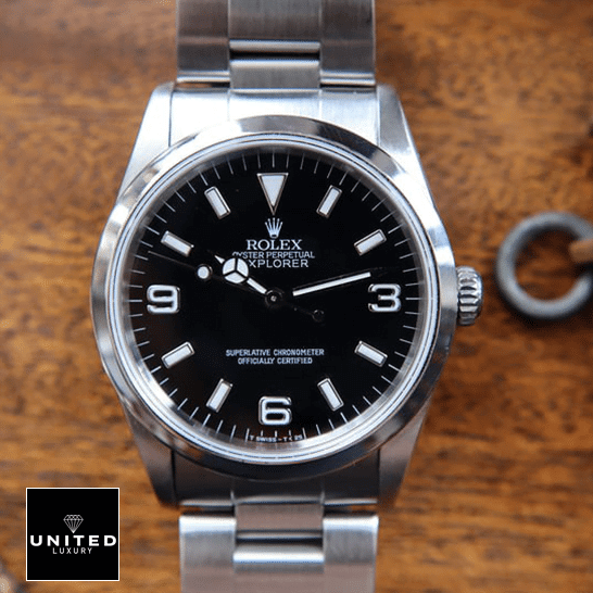Rolex 124270 Replica 3 Rolex Explorer 124270 Black Dial Replica on the brown Table