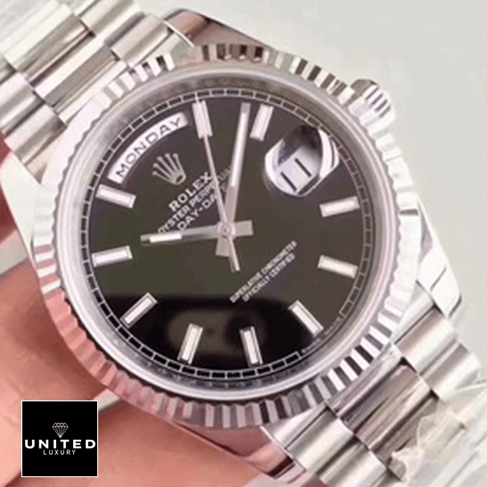 Rolex Silver Replica 1 Rolex Day-Date 228239 Black Dial Replica on the hand