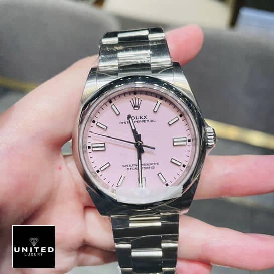 Rolex Perpetual Pink 124300 Replica 3 Rolex Oyster Perpetual 124300 Oyster Replica on his hand