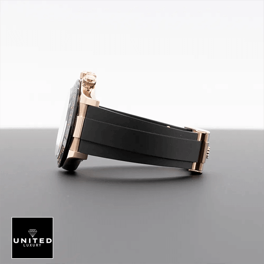 Rolex Daytona Cosmograph Automatic Rose Gold 116515LN-0012 Replica 5 Rolex Daytona Cosmograph Black Rubber Bracelet 116515LN-0012 Replica on the table