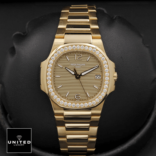 Patek Philippe Nautilus 7010/1R-012 Replica 6 Patek Philippe Nautilus 70101R-012 Diamond Bezel Gold Bracelet Replica black background
