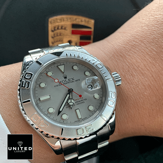 Rolex Oyster Perpetual Yacht-Master Replica 5 Rolex 116622PLSO Platinum Dial Steel Replica porsche in the background