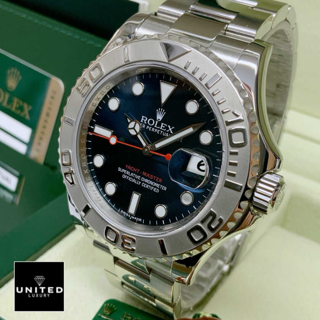 Rolex Yacht-Master 116622 Stainless Steel Dark Rhodium Dial Replica 3 Rolex 116622 Yacht Master Oyster Replica next to warranty card