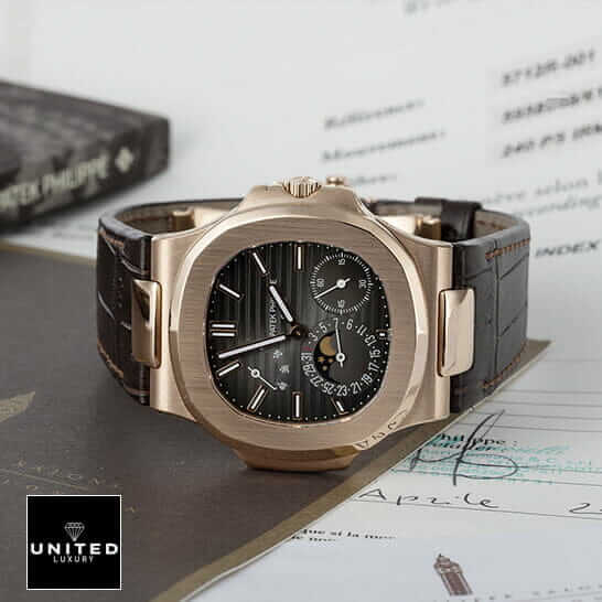 Patek Philippe Nautilus Gold Leather Replica 2 Patek Philippe 5712R Rose Gold Bezel Black Dial Replica side view
